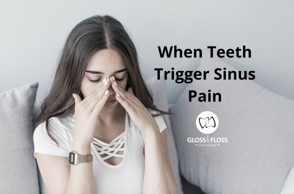 Woman massaging her sinuses due to dental sinusitis.