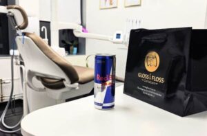 Energy Drinks and Tooth Erosion – energy drink can beside dental chair at Gloss & Floss Dental Care, Stockholm.