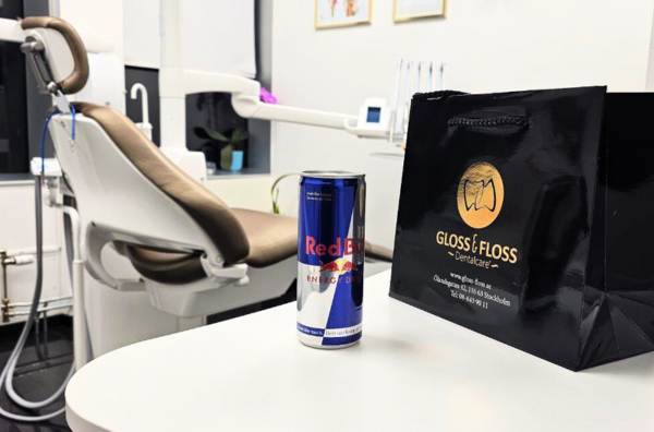 Energy Drinks and Tooth Erosion – energy drink can beside dental chair at Gloss & Floss Dental Care, Stockholm.
